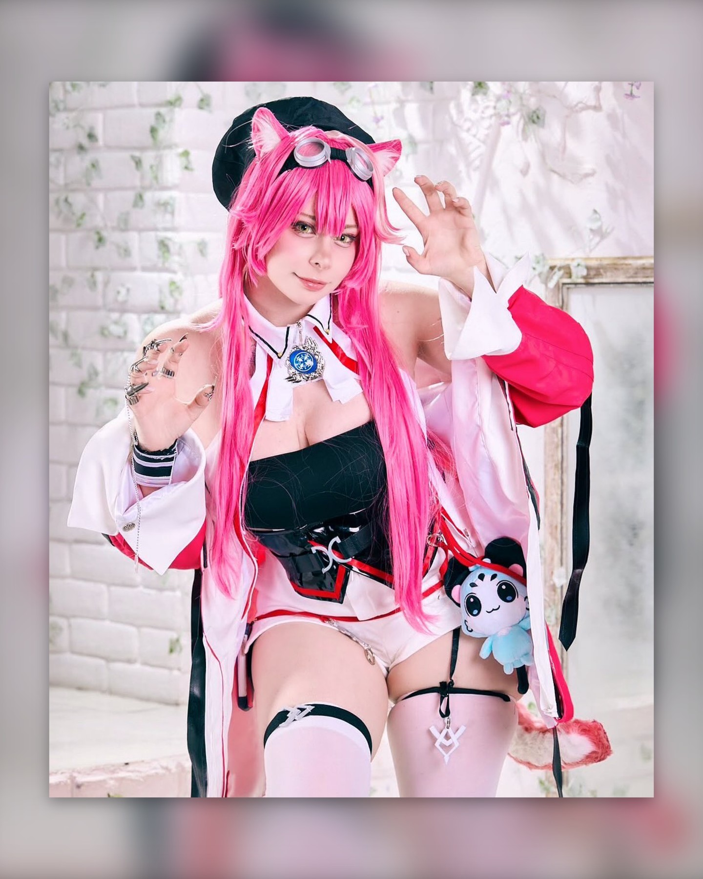 Pink twin-tail cosplay with panda plush